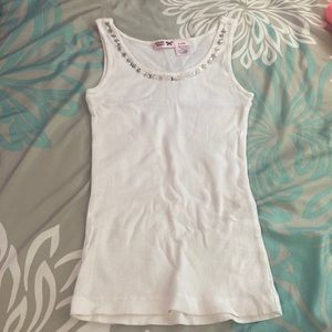 White tank top with brown and clear beads on neckline in a flower pattern